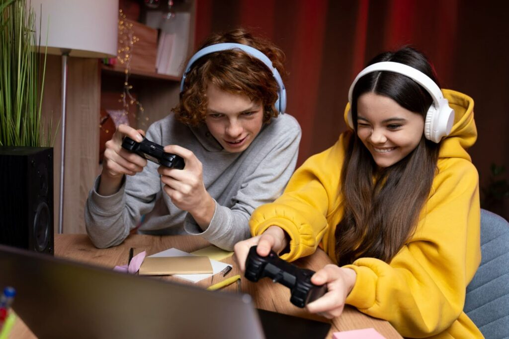 Teen gamers immersed in a multiplayer video game session at home with controllers