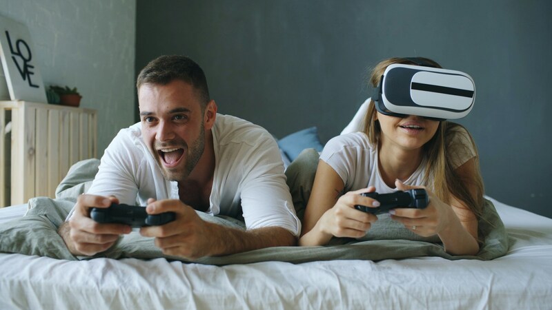Players having fun exploring both VR and standard gameplay together.