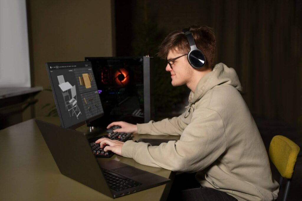 A man using AI-driven quality assurance software to test and improve game quality.
