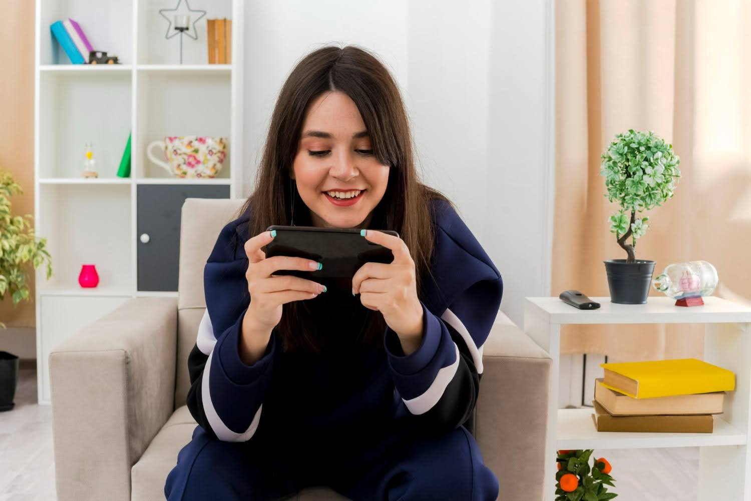 A gamer playing an AI-powered game on a smartphone