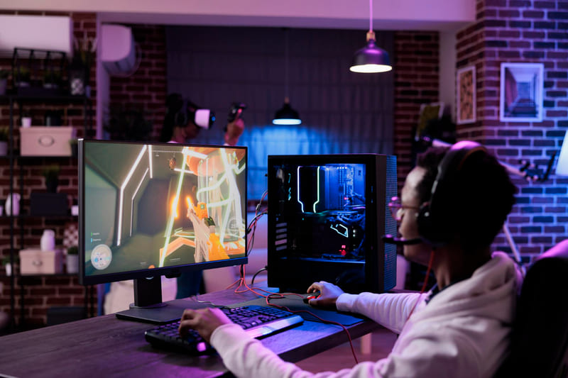 The PC gaming scene captures the interactive gameplay of today’s modern games.