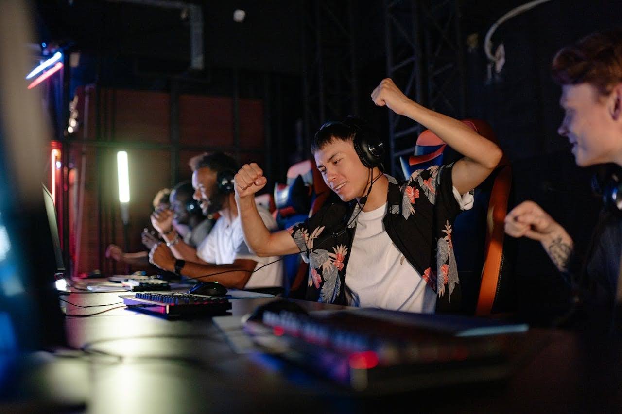Players celebrating a victory at the global esports tournament.