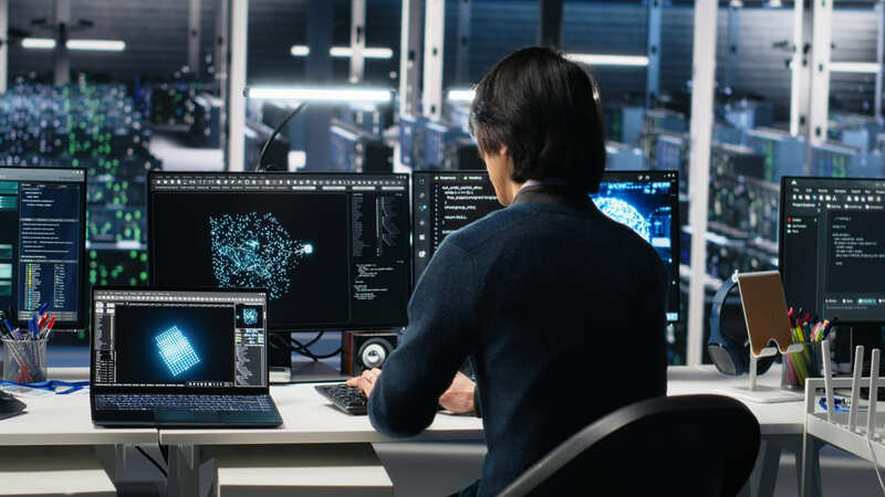 A developer breaking down a game’s system to learn its engine and mechanics.