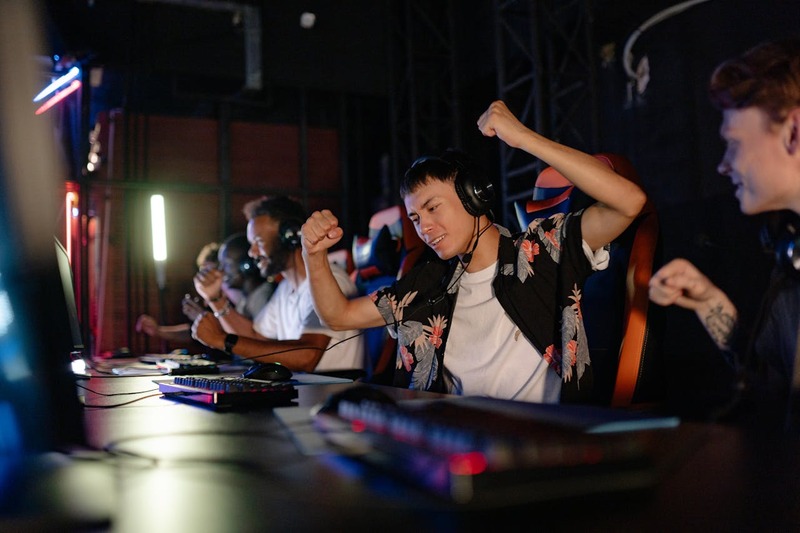 Players celebrating a victory at the global esports tournament.