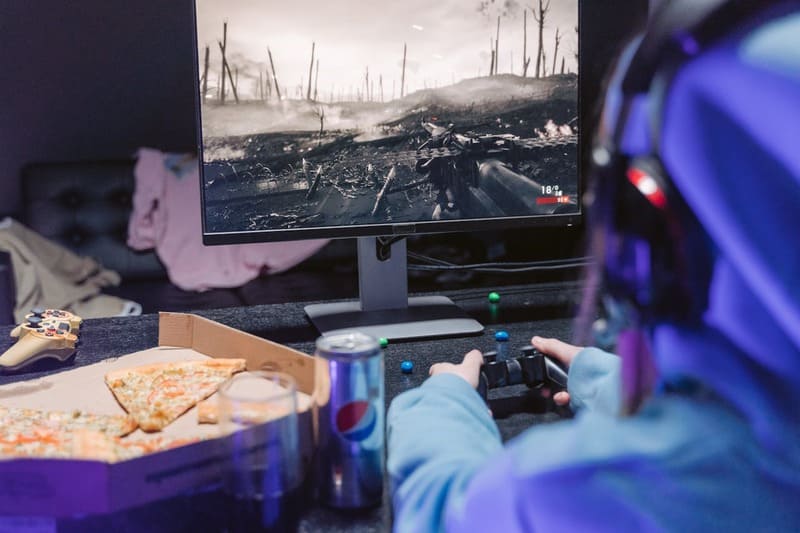 A gamer enjoying a video game tailored for global gaming communities.