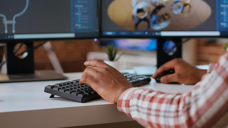 A game developer refines the UI design by adjusting the font hierarchy and layout for clarity.