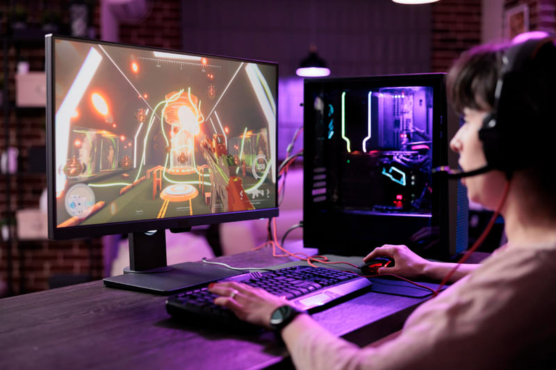 A female gamer engages in visual narrative gameplay with branching story choices.