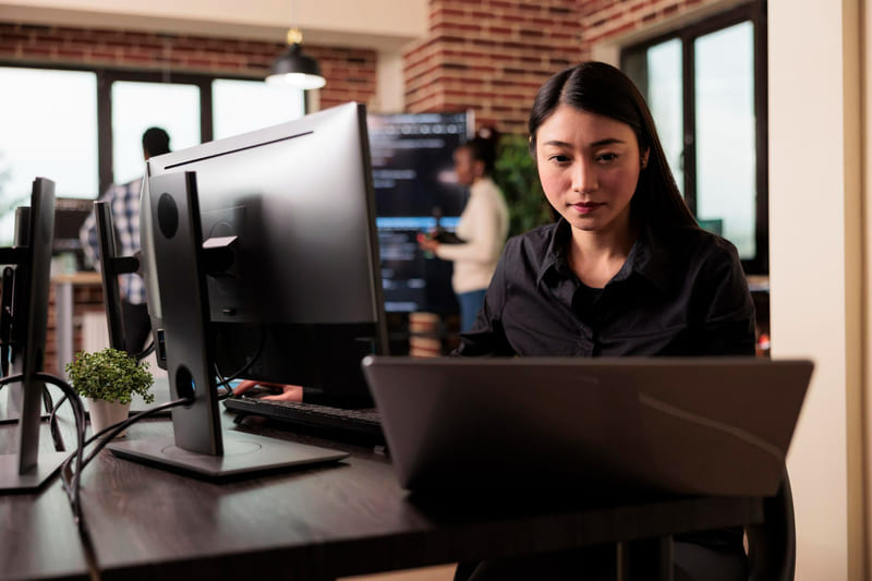 A game developer ensuring IGRS compliance with international privacy and cybersecurity requirements while examining safe data systems.