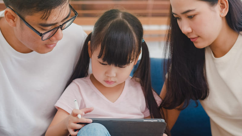Parents supervise their child's access to online gaming content