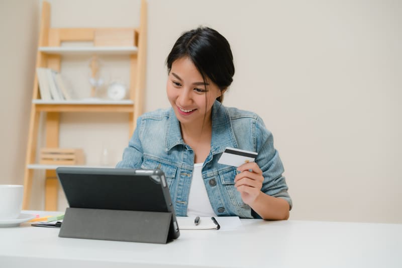 An illustration of a gamer completing an in-game item from a digital storefront.