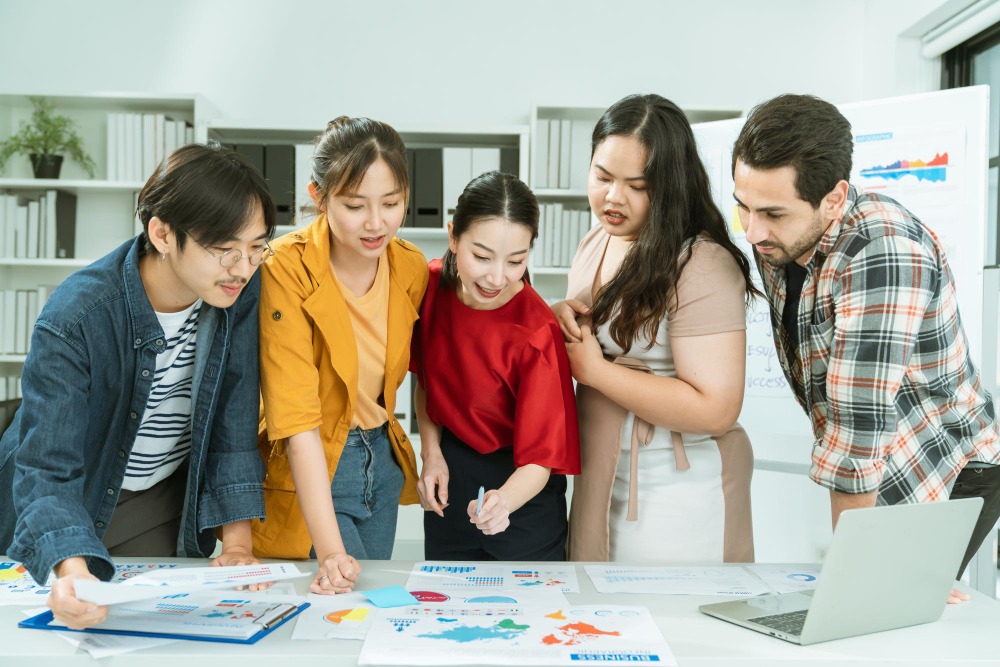 Developer team planning localization for a game to reach players worldwide