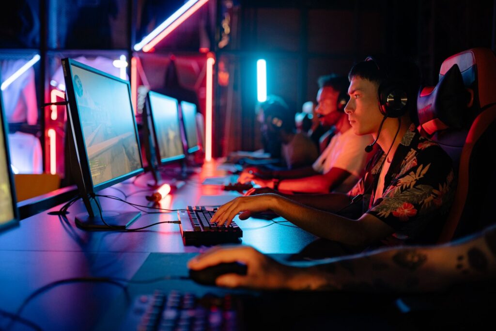 A team of professional gamers representing Thailand in an international esports tournament.