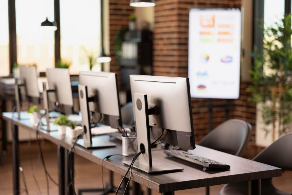 A modern internet cafè in Vietnam designed for multiplayer PC gaming sessions.