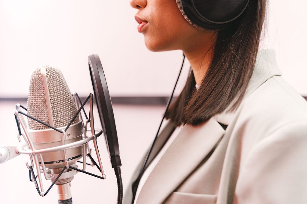 Voice-over artist recording localized audio that connects Southeast Asian players.