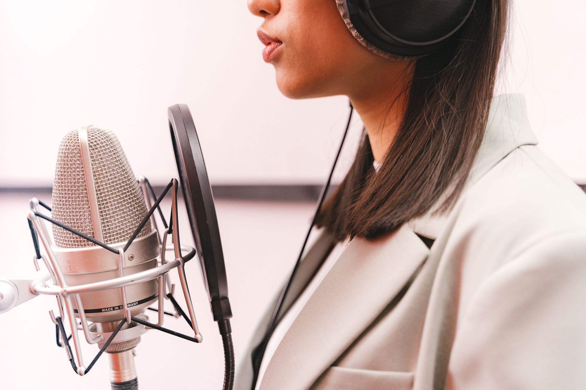 Voice-over artist recording localized audio that connects Southeast Asian players.