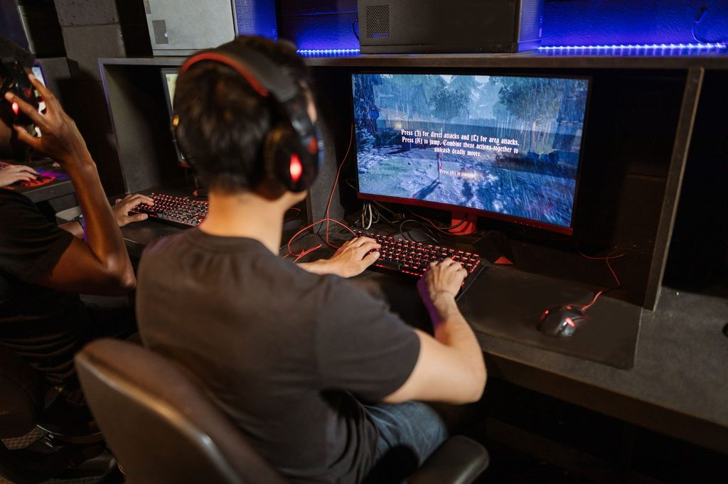 A player reads on-screen instructions while playing, emphasizing the significance of clear, localized game content.