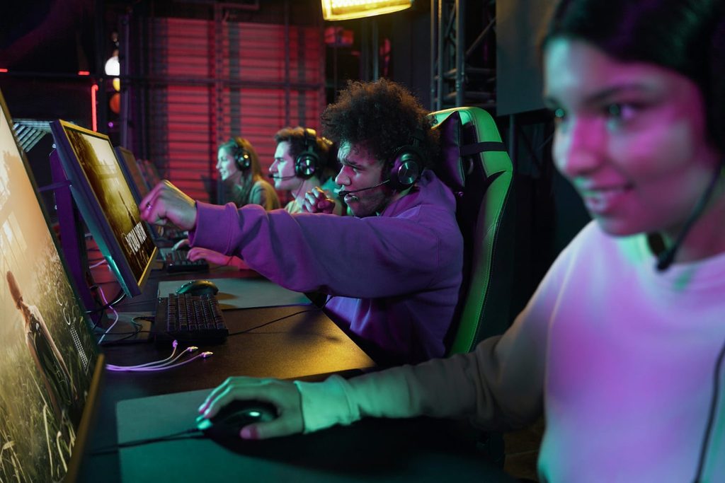 Esports players compete in a professional gaming setting, highlighting the localization demands of fast-paced global tournaments like EWC 2026.